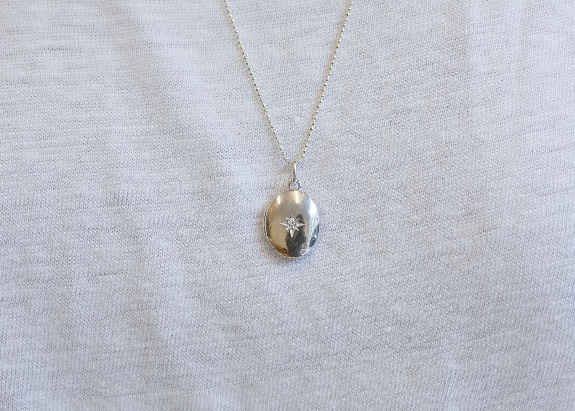 Collier avec pendentif porte-photo petite étoile et strass